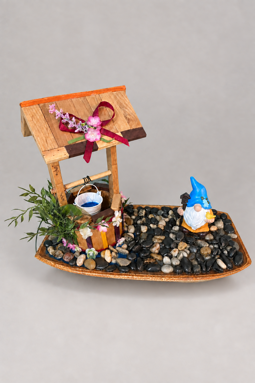 Handmade fairy-tale garden woodwork display with neutral studio background